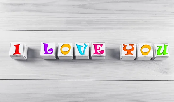 I love you spelled in wooden blocks — Stock Photo, Image