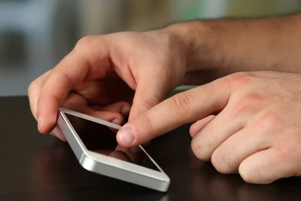 Hand holding mobile smart phone — Stock Photo, Image