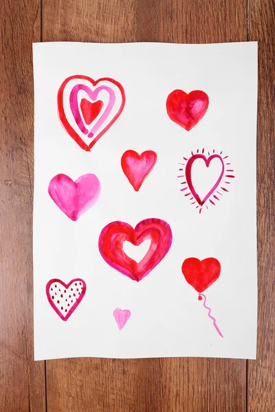 Painted hearts on sheet — Stock Photo, Image