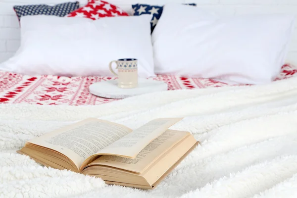 Book on bed close-up — Stock Photo, Image