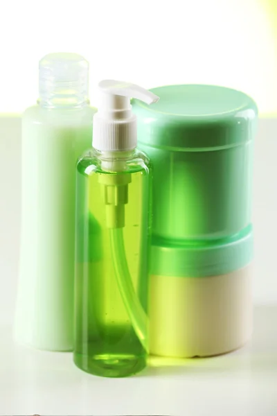 Cosmetic bottles on white background — Stock Photo, Image