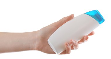 El ile üzerine beyaz izole kozmetik şişe