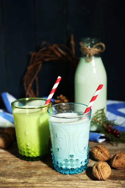 Fresh milk with natural decor, on wooden background — Stock Photo, Image