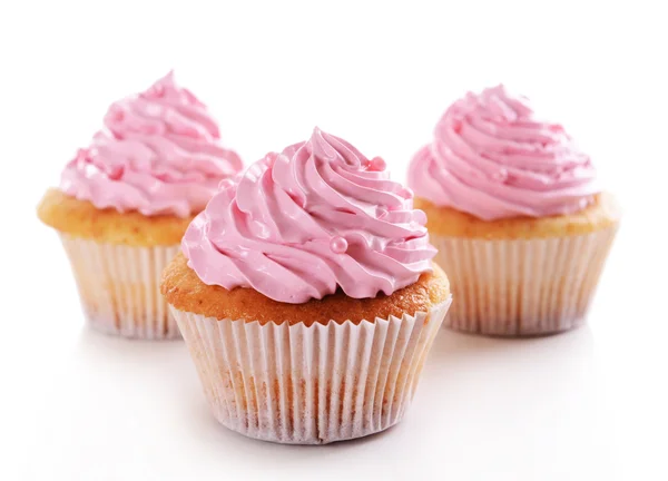 Deliciosos cupcakes isolados em branco — Fotografia de Stock