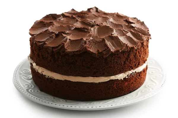 Delicioso pastel de chocolate en plato aislado en blanco — Foto de Stock