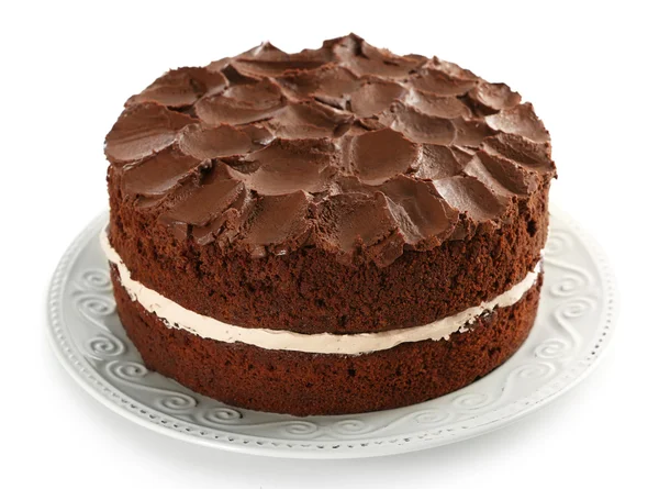 Delicioso pastel de chocolate en plato aislado en blanco — Foto de Stock