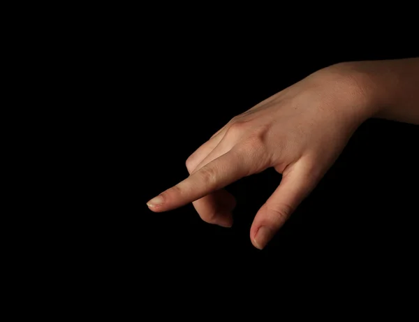 Female hand gesture on black background — Stock Photo, Image