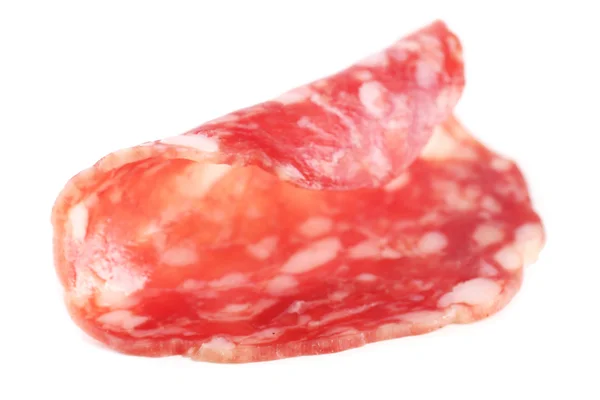 Scheibe Salami isoliert auf weißem Hintergrund — Stockfoto