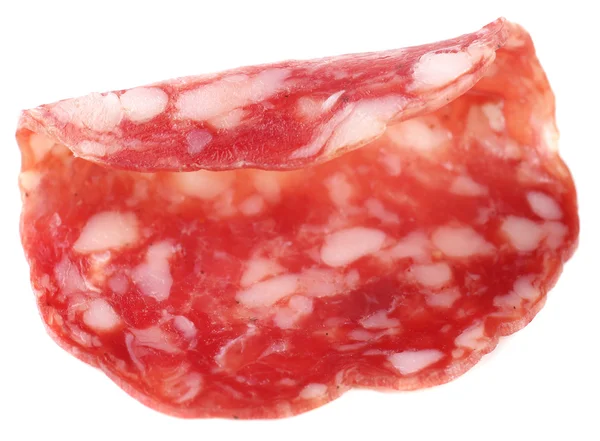 Rebanada de salami aislada sobre fondo blanco —  Fotos de Stock