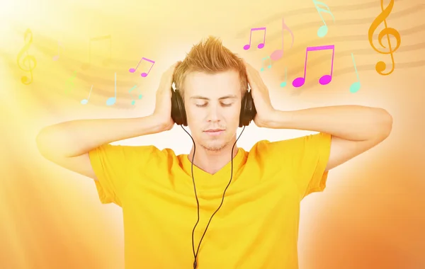Man with headphones listening music — Stock Photo, Image