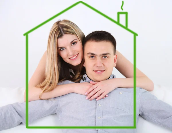 Loving couple in drawing house — Stock Photo, Image