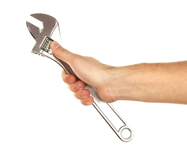 Llave ajustable en mano masculina aislada en blanco —  Fotos de Stock