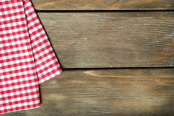 Napkin on wooden table — Stock Photo, Image