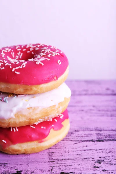 Delicious donuts with icing — Stock Photo, Image