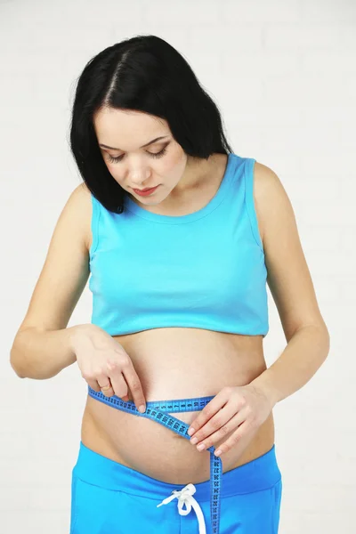 Young pregnant woman — Stock Photo, Image