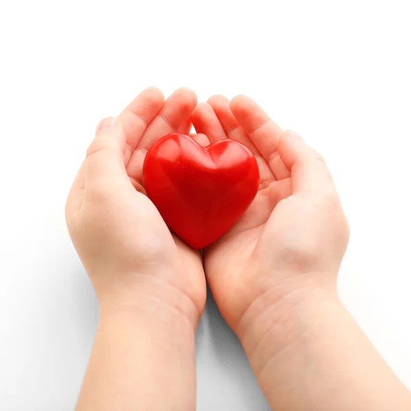 Hjärtat i barnet händer — Stockfoto
