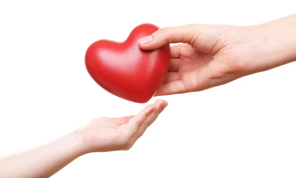 Corazón en manos de niño y madre — Foto de Stock