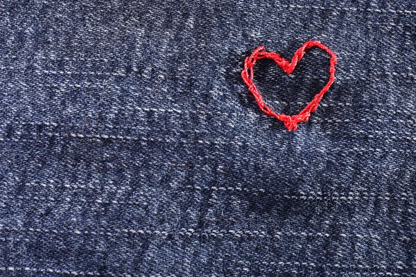 Tecido de calça com coração — Fotografia de Stock