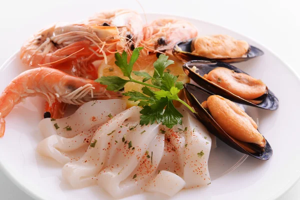 Tasty seafood on plate close-up — Stock Photo, Image