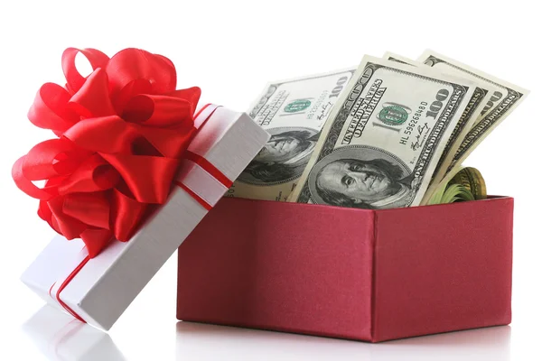 Bundle of dollars in present box with bow isolated on white — Stock Photo, Image