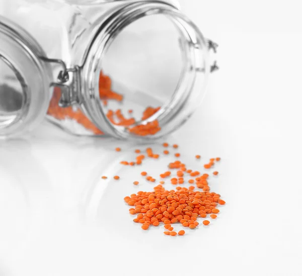 Remnants of lentils in glass jar — Stock Photo, Image