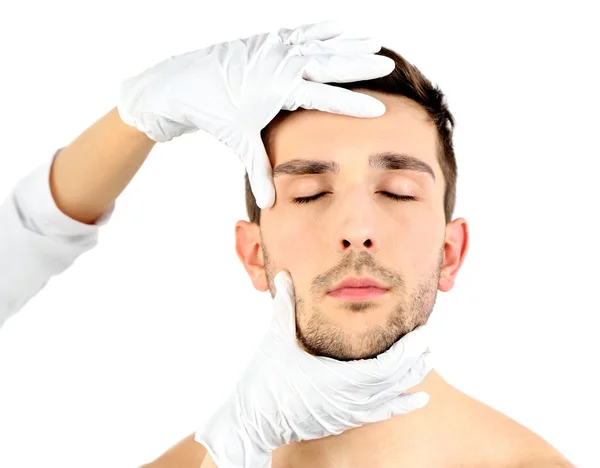 Doctor examines young man — Stock Photo, Image