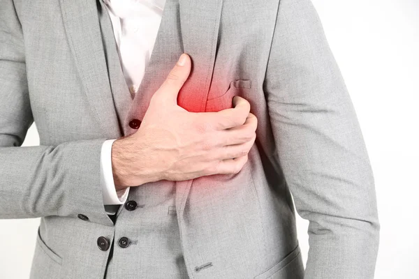 Man having chest pain — Stock Photo, Image