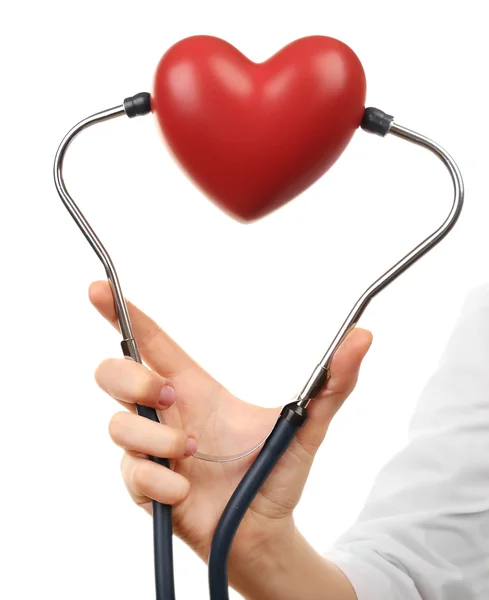 Stéthoscope avec cœur dans les mains du médecin — Photo