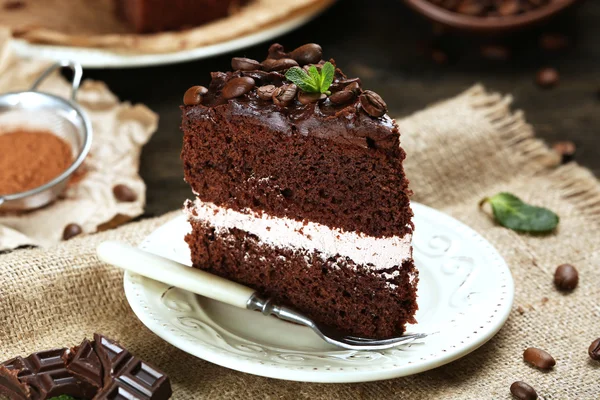 Delicious chocolate cake on table close-up — Stock Photo, Image