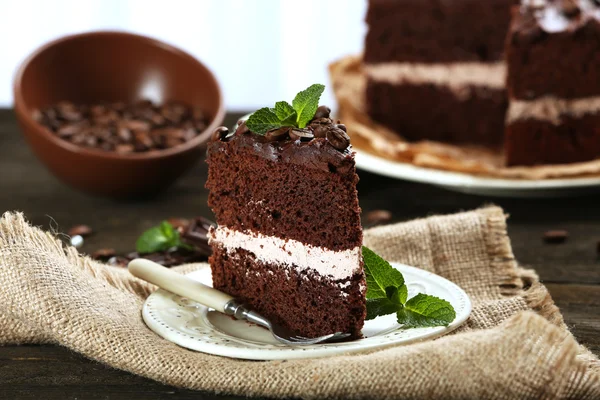 Delicious chocolate cake on table close-up — Stock Photo, Image