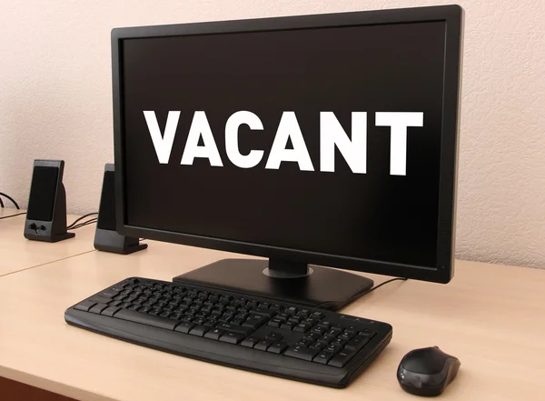 Office workplace with vacant sign — Stock Photo, Image