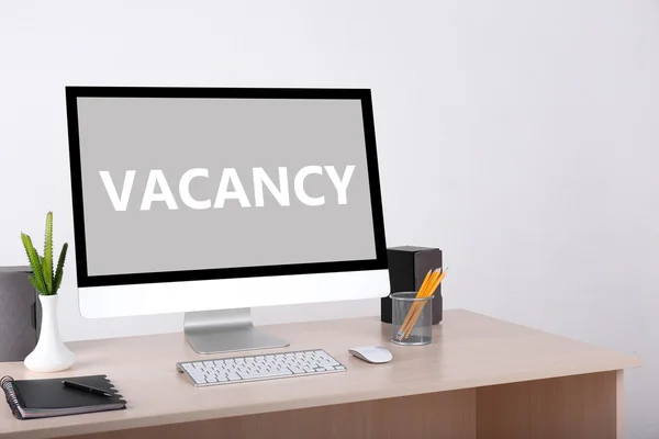 Office workplace with vacancy sign — Stock Photo, Image