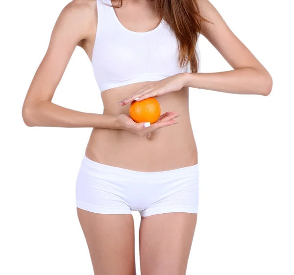 Young woman with orange isolated on white — Stock Photo, Image