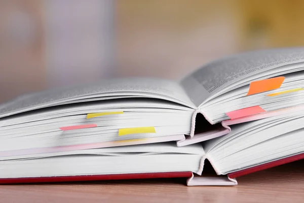 Books with bookmarks on table — Stock Photo, Image