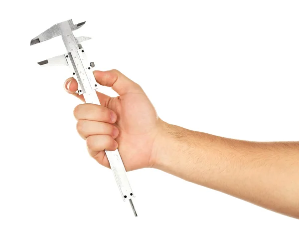 Verstelbare sleutel in mannenhand geïsoleerd op wit — Stockfoto