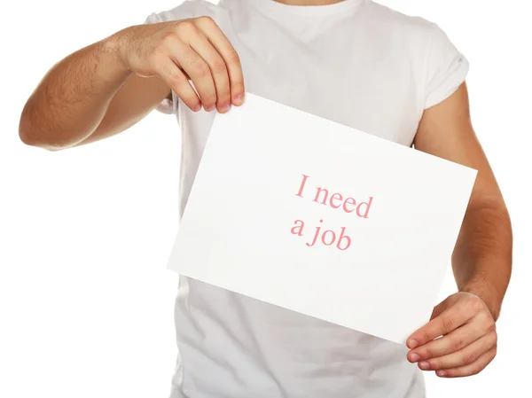 Feuille de papier avec inscription J'ai besoin d'un emploi dans les mains des hommes isolés sur blanc — Photo