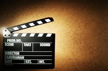 Tahta arka planda film alkışlaması