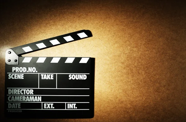 Movie clapper on wooden background — Stock Photo, Image