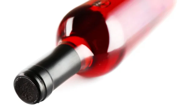 Botella de vino tinto acostado, aislado en blanco —  Fotos de Stock