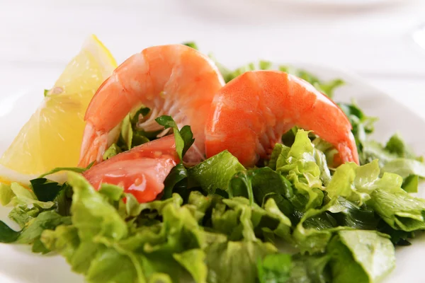 Tasty seafood on plate on table close-up — Stock Photo, Image