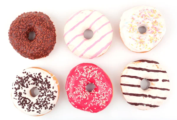 Leckere Donuts mit Sahnehäubchen — Stockfoto