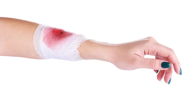 Mão ferida com bandagem isolada em branco — Fotografia de Stock