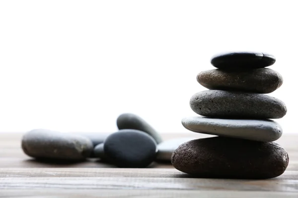 Spa stones on table — Stock Photo, Image