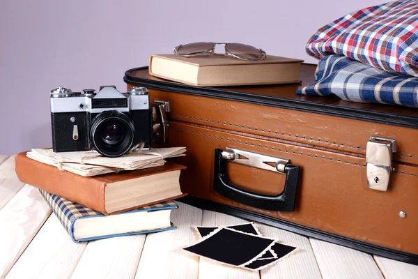 Vintage suitcase with clothes — Stock Photo, Image