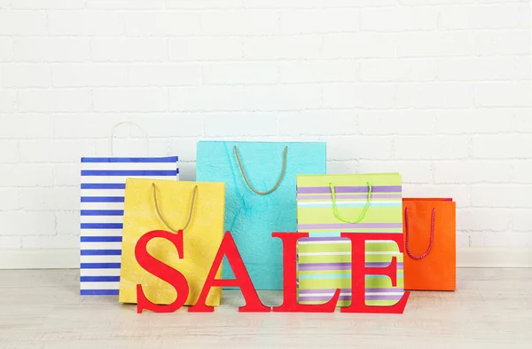 Sale with bags on floor — Stock Photo, Image