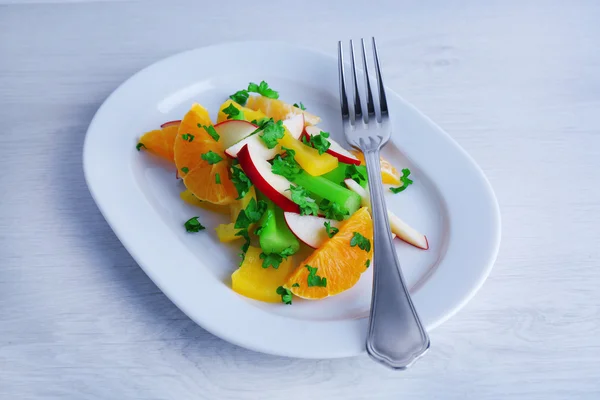 Waldorf salad with orange on plate on table close up — Stock Photo, Image