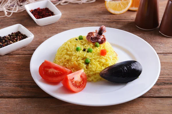 Seafood Paella on plate on table close-up — Stock Photo, Image