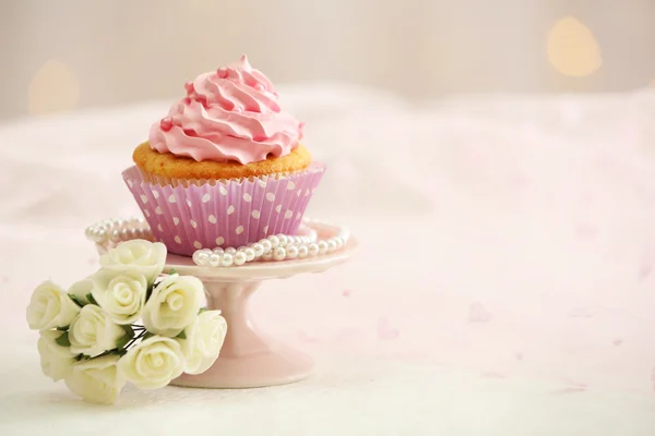 Sweet cupcake on table — Stock Photo, Image