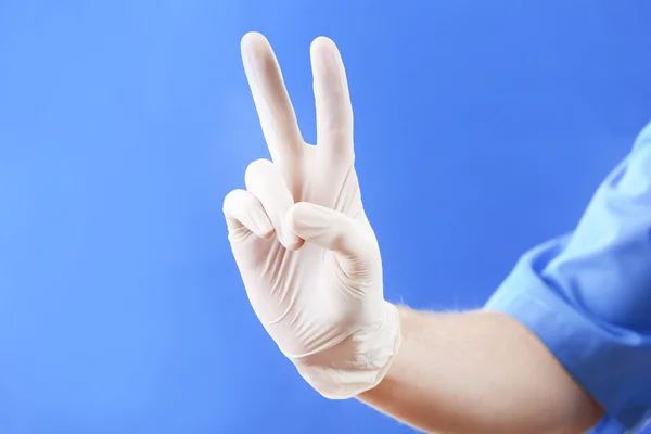 Doctor hand in sterile gloves — Stock Photo, Image