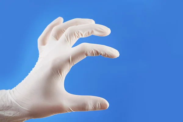 Mano de doctor en guantes estériles — Foto de Stock